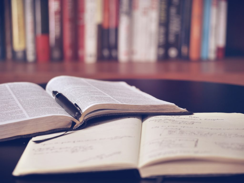 Books on desk: coronavirus outbreak private tuition. 